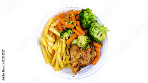Fried pork chop with french fries and vegetables in plastic box isolated on white background