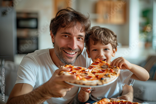 Father and son holding a pizza together indoors. Generative AI.