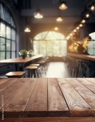 Empty old wood table top and blurred bokeh cafe and coffee shop interior background with vintage filter - can used for display or montage your products.