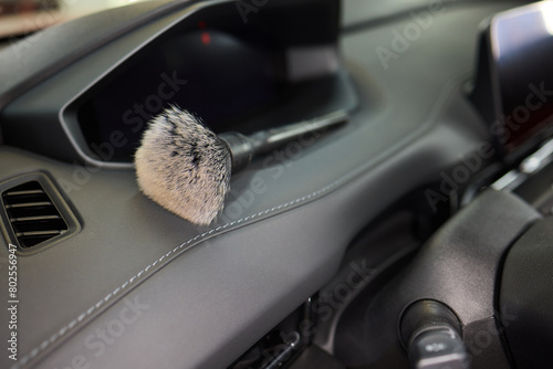 Vehicle dashboard includes a brush photo