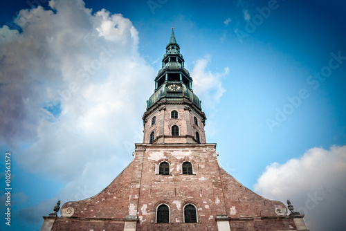 Main facade of Riga Church of Saint Peter in the afternoon. Saint Peter Church Cathedral also called Sveta Petera Evangeliski luteriska baznica, it's a evangelical lutheran protestant church in Latvia photo