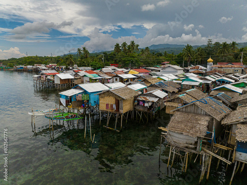 Top view of Stilt houses in the Zamboanga coastline. Clear turquoise water. Mindanao, Philippines.