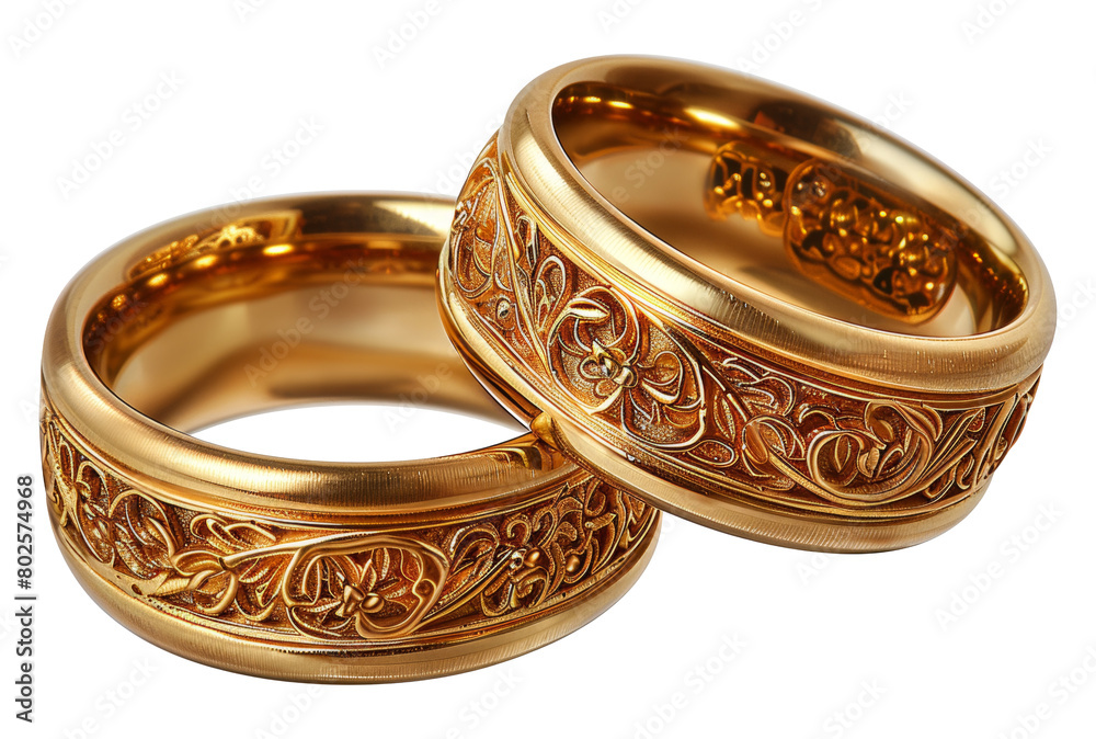 Ornate golden wedding bands with intricate engraving isolated on transparent background Ornate golden wedding bands with intricate engraving isolated on transparent background