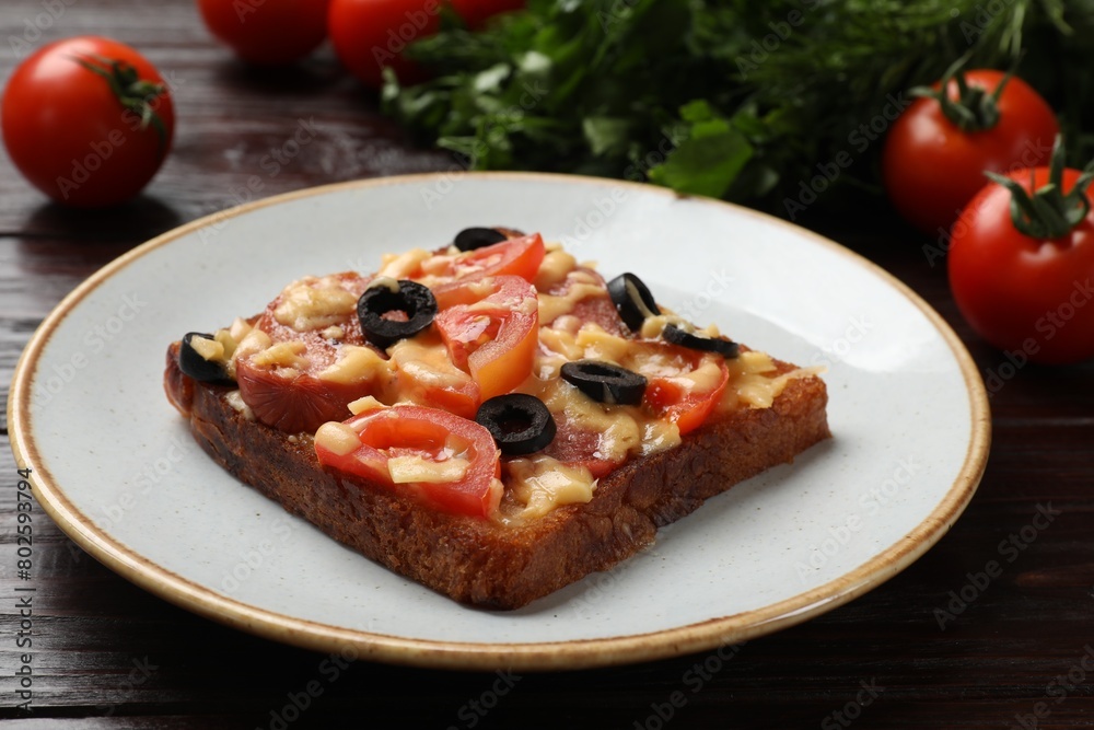 Tasty pizza toast on wooden table, closeup Tasty pizza toast on wooden table, closeup