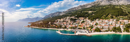 Beautiful Brela on Makarska riviera  Croatia. Adriatic Sea with amazing turquoise clean water and white sand. Aerial view of Brela beach and waterfront on Makarska riviera  Dalmatia region of Croatia.