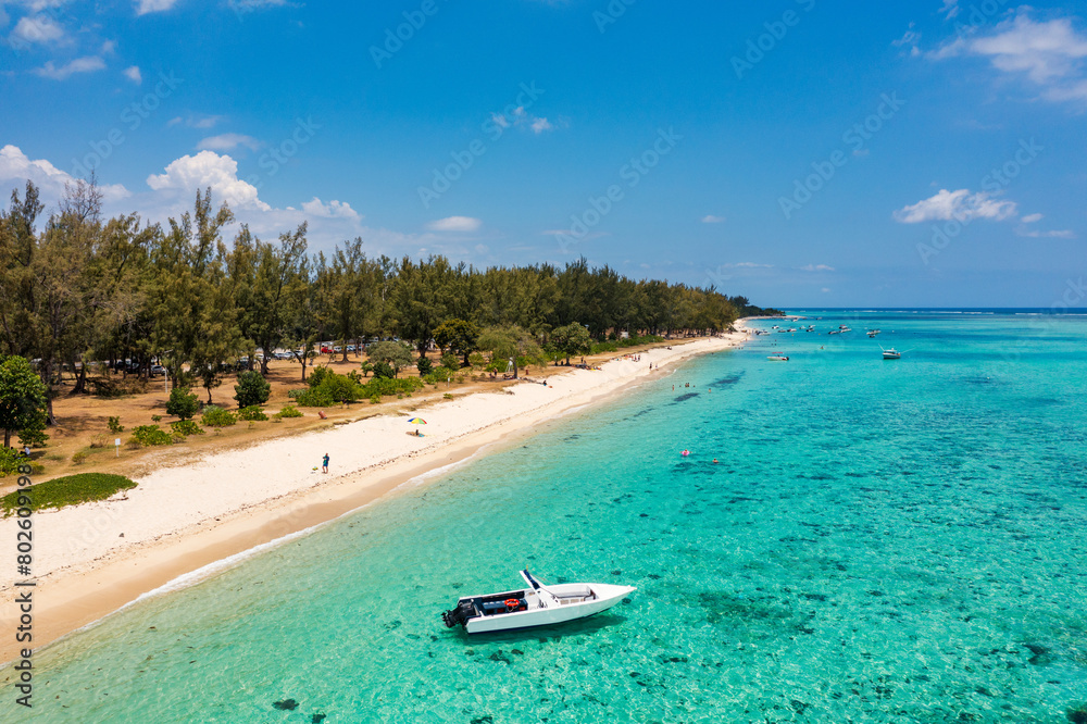 Tropical scenery, beautiful beaches of Mauritius island, Le Morne, popular luxury resort. Le Morne beach luxury resorts, Mauritius. Luxury beach in Mauritius, sandy beach with palms and blue ocean.