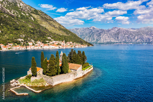 Saint George Island and Church of Our Lady of the Rocks in Perast, Montenegro. Our Lady of the Rock island and Church in Perast on shore of Boka Kotor bay (Boka Kotorska), Montenegro, Europe.