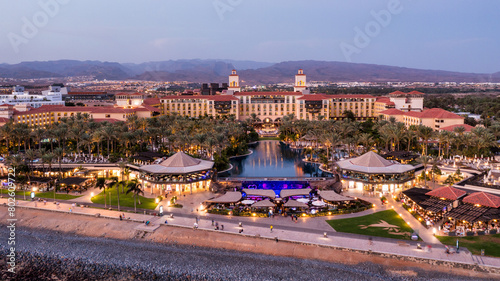 Aerial drone of the popular resort town of Meloneras, with hotels and restaurants, near the Maspalomas dunes in Gran Canaria, Canary Islands, Spain