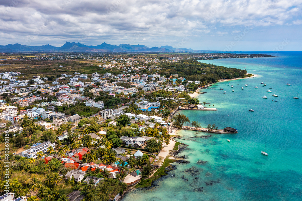 Mauritius beach aerial view of Mont Choisy beach in Grand Baie, Pereybere North. Mont Choisy, public beach in Mauritius island, Africa. Beautiful beach of Mont Choisy in Mauritius, drone aerial view.