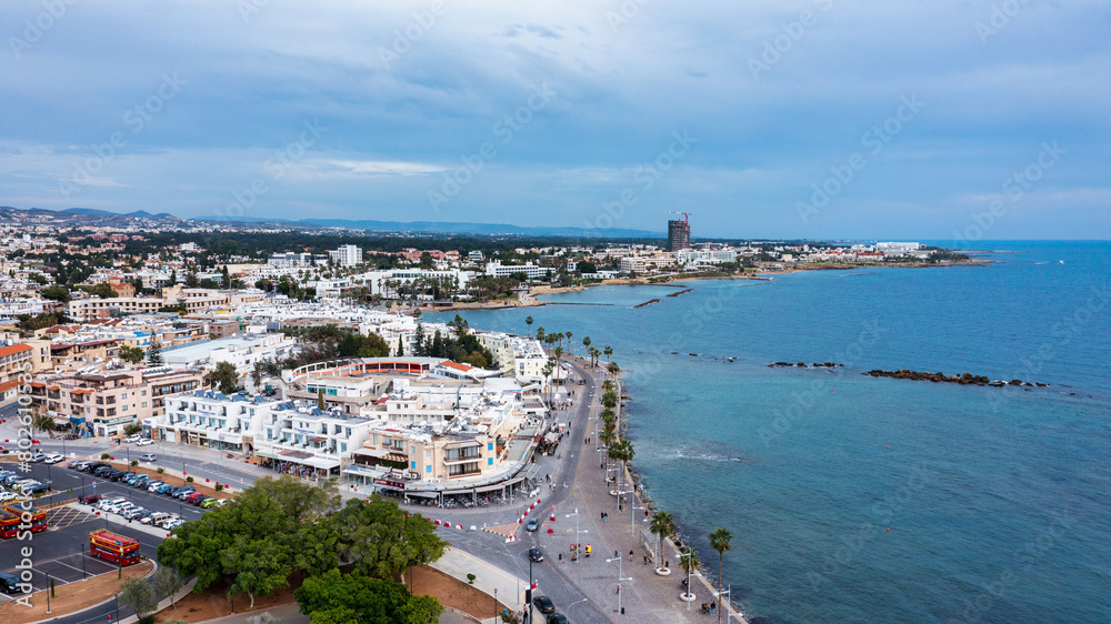 View of the town of Paphos in Cyprus. Paphos is known as the center of ancient history and culture of the island. View of embankment at Paphos Harbour, Cyprus.