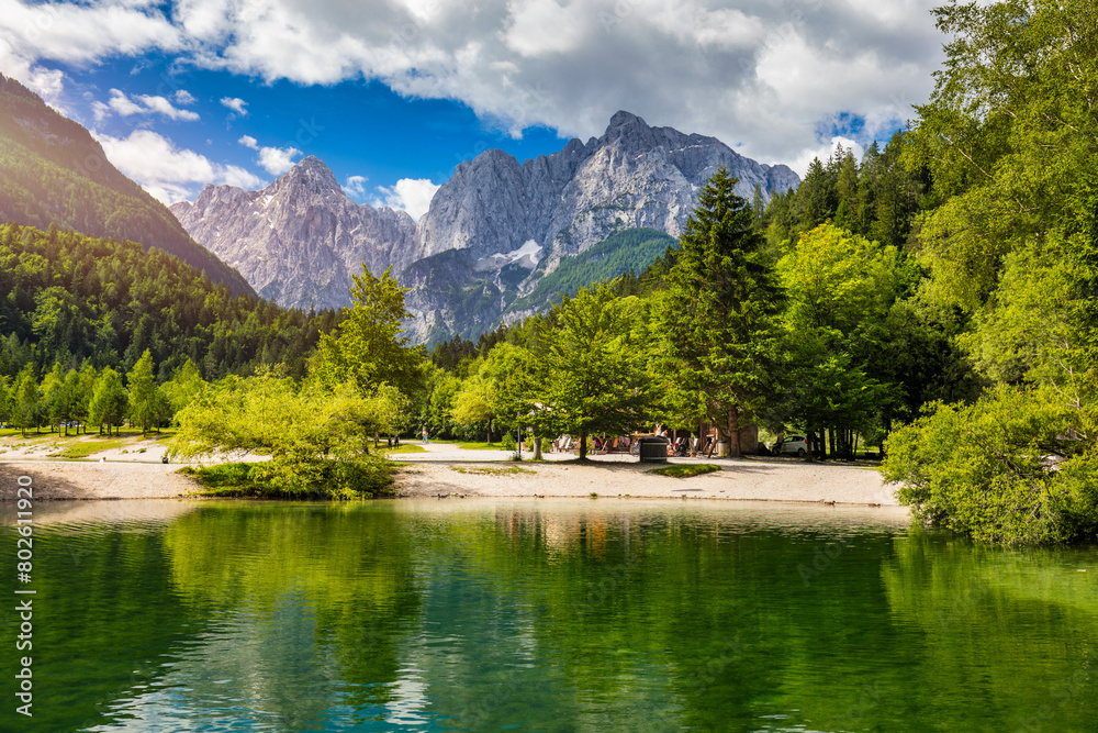 Fototapeta premium Great nature scenery in Slovenian Alps. Incredible summer landscape on Jasna lake. Triglav national park. Kranjska Gora, Slovenia. Mountain lake Jasna in Krajsnka Gora, Slovenia.