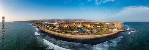 Aerial drone of the popular resort town of Meloneras, with hotels and restaurants, near the Maspalomas dunes in Gran Canaria, Canary Islands, Spain photo
