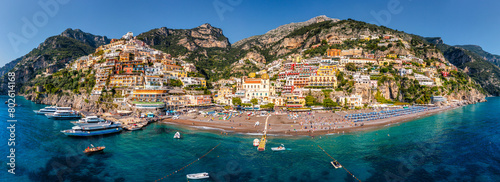 Aerial view of Positano with comfortable beach and blue sea on Amalfi Coast in Campania  Italy. Positano village on the Amalfi Coast  Salerno  Campania. Beautiful Positano  Amalfi Coast in Campania.