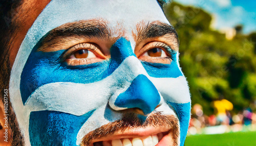 Sports Fan With Blue And White Painted Face