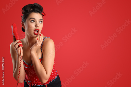 Shocked young pin-up woman ...