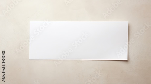 Minimalist business concept: blank paper note with adhesive tape on white background for office reminders and messages

