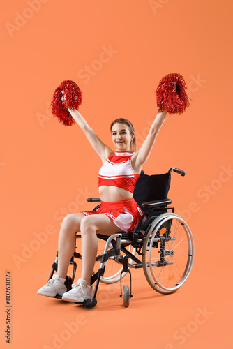 Young cheerleader in wheelc...