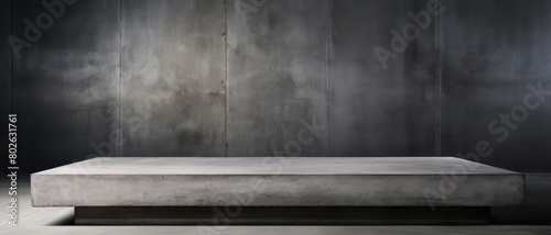 Minimalist concrete podium in an industrial setting, textured backdrop,