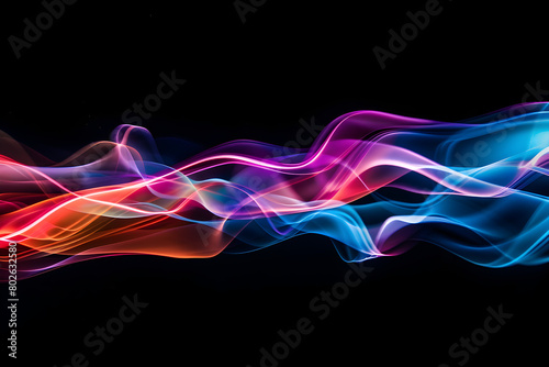 Energetic neon waves crashing in vibrant colors. Dramatic art on black background. photo