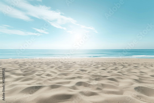 Pristine Beach with Soft Sand and Calm Blue Waters Under a Clear Sky.