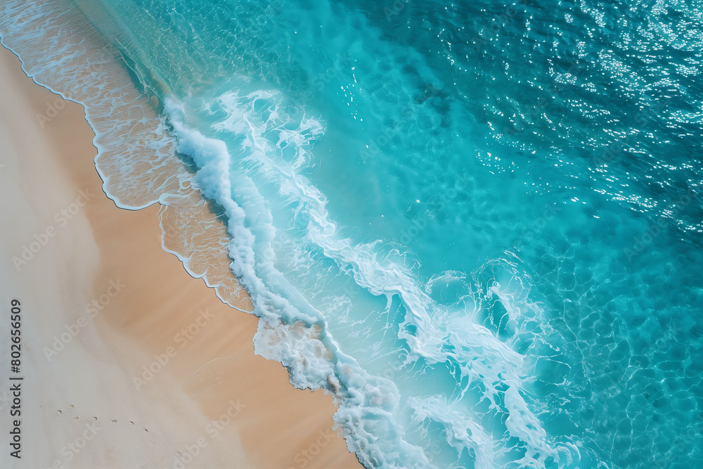 Aerial view of the natural landscape of a tranquil beach with turquoise waters and white sand. Aerial view of the natural landscape of a tranquil beach with turquoise waters and white sand.