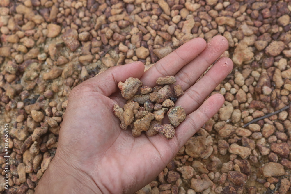 Red gravel. small red pebbles. Can be used for natural aquariums with red brown color. contained in and plains of red soil Red gravel. small red pebbles. Can be used for natural aquariums with red brown color. contained in and plains of red soil