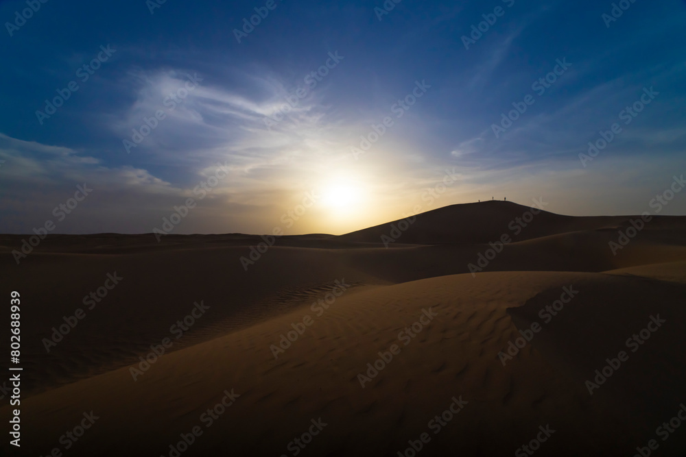 A dusk of panoramic sand dune at Mhamid el Ghizlane in Morocco wide shot
