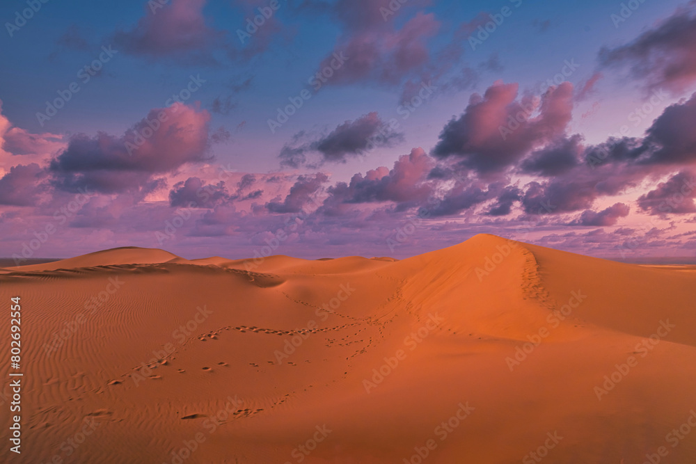 A dusk of panoramic sand dune at Mhamid el Ghizlane in Morocco wide shot