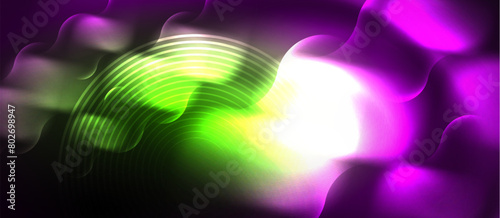 An event with a vibrant purple and green background, accented with glowing magenta light in the middle. Visual effect lighting creates an electric atmosphere for entertainment