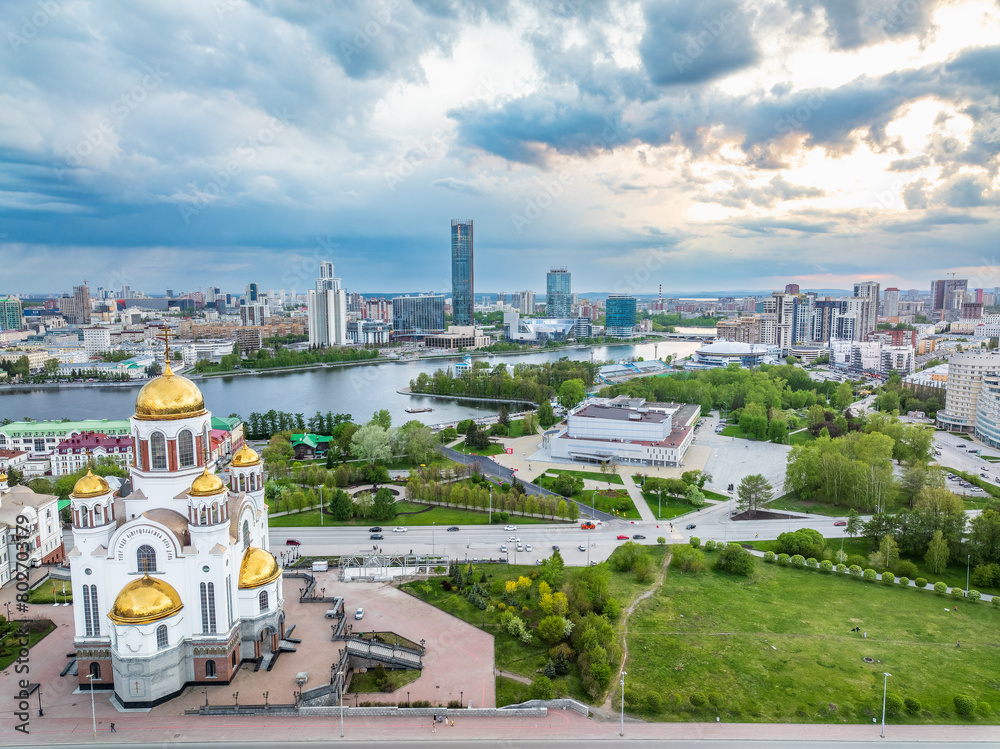 Summer Yekaterinburg and Temple on Blood in beautiful clear sunset.. Aerial view of Yekaterinburg, Russia. Translation of the text on the temple: Honest to the Lord is the death of His saints.
