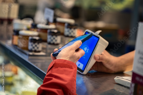 Mobile contactless payment at a market photo