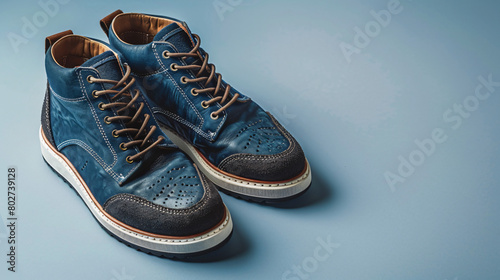 Pair of casual male shoes on light background