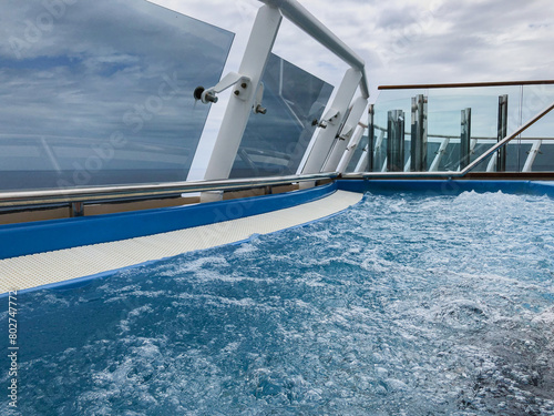 Glass enclosed whirlpool with ocean view onboard modern Italian cruiseship cruise ship ocean liner photo