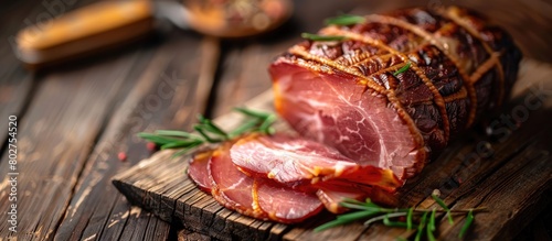 Italian smoked ham on a wooden tabletop photo