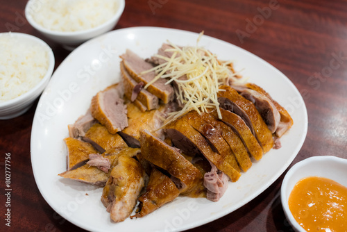 Slice of goose meat in plate at restaurant