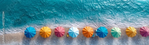 Colorful Beach Umbrellas Lining Tropical Shoreline with Crystal Clear Waters. Horizontal banner with copy space