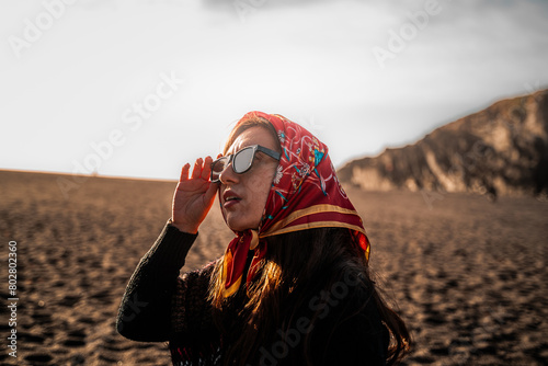 Woman enjoying the stunning scenery of Cobquecura, Nuble Region, Chile photo