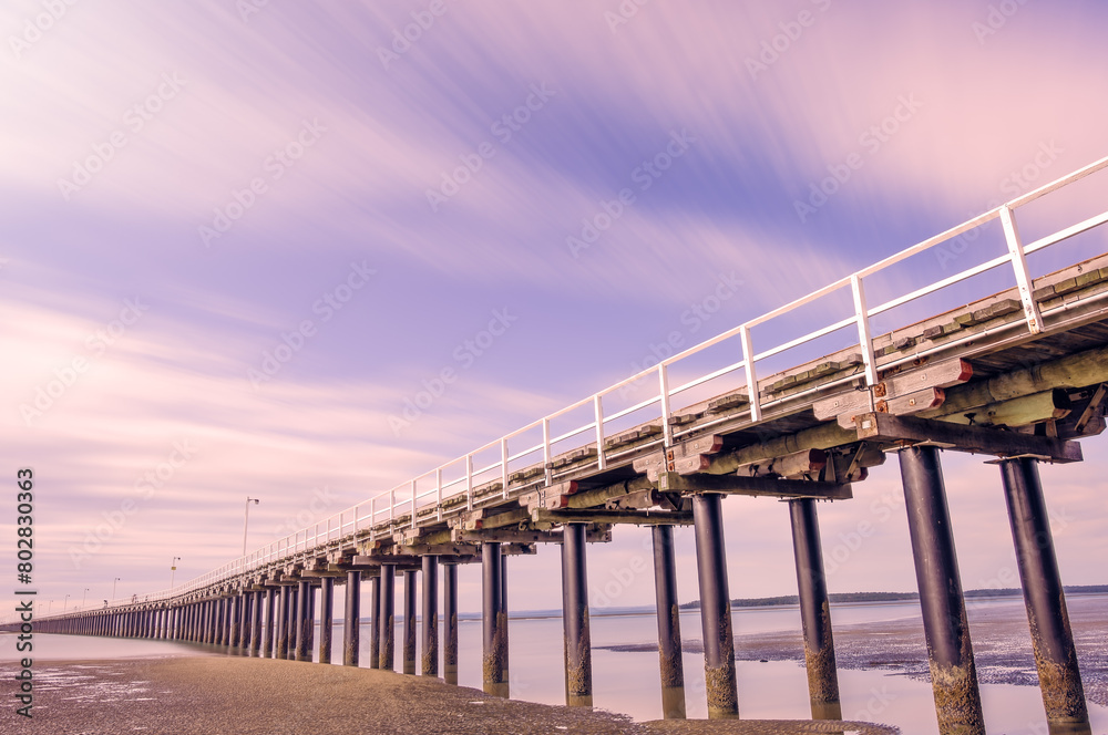 Urangan pier jetty, Hervey Bay, Queensland, Australia, long exposure, dramatic architecture clouds water reflection Urangan pier jetty, Hervey Bay, Queensland, Australia, long exposure, dramatic architecture clouds water reflection