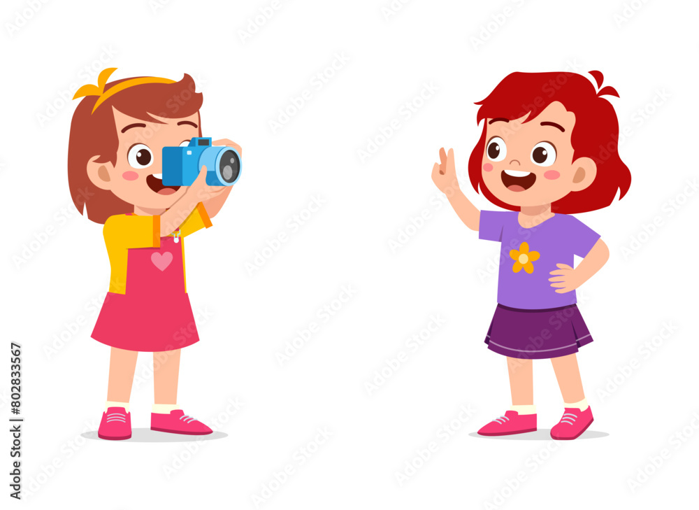 little kid holding camera and take photo of friend little kid holding camera and take photo of friend