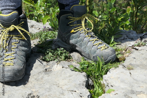 Hiking boots laced up for a tour