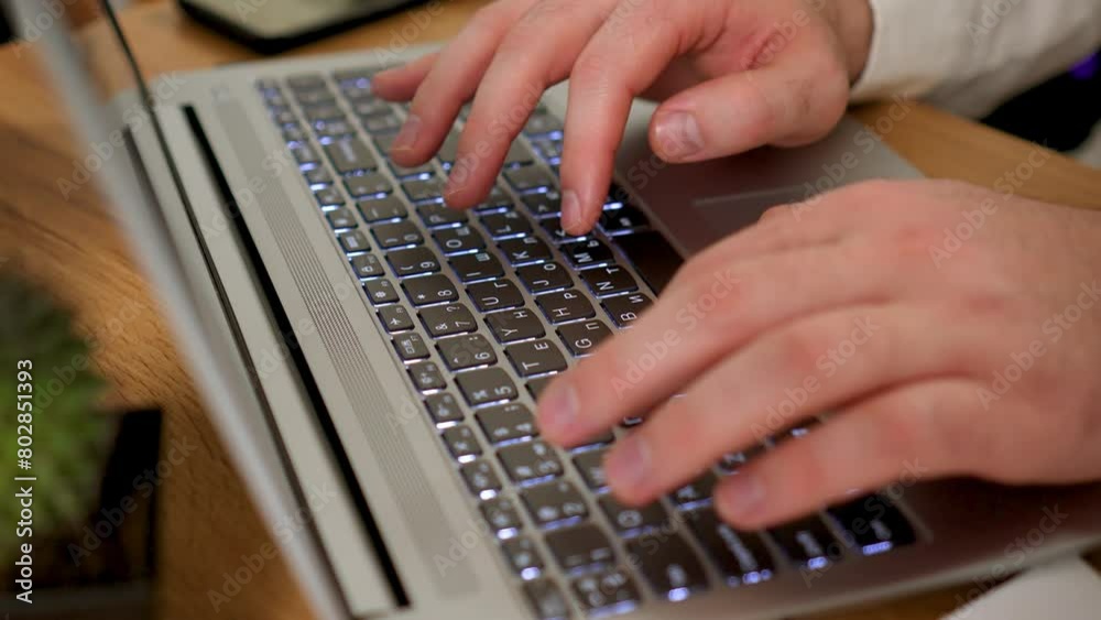 Typing on laptop keyboard close up. Businessman hands busy working on notebook or computer keyboard for send emails and surf on web browser. Male Freelancer working from home. Browsing internet, using