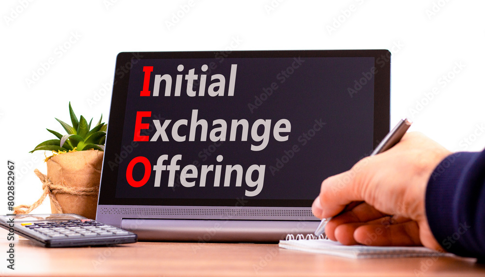 IEO initial exchange offering symbol. Concept words IEO initial exchange offering on beautiful black tablet. Beautiful white background. Business IEO initial exchange offering concept. Copy space. IEO initial exchange offering symbol. Concept words IEO initial exchange offering on beautiful black tablet. Beautiful white background. Business IEO initial exchange offering concept. Copy space.