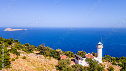The scenic view of Gelidonya Lighthouse, which is one of the guide lighthouses of the Mediterranean, on the historical Lycian Way, Kumluca, Antalya. photo