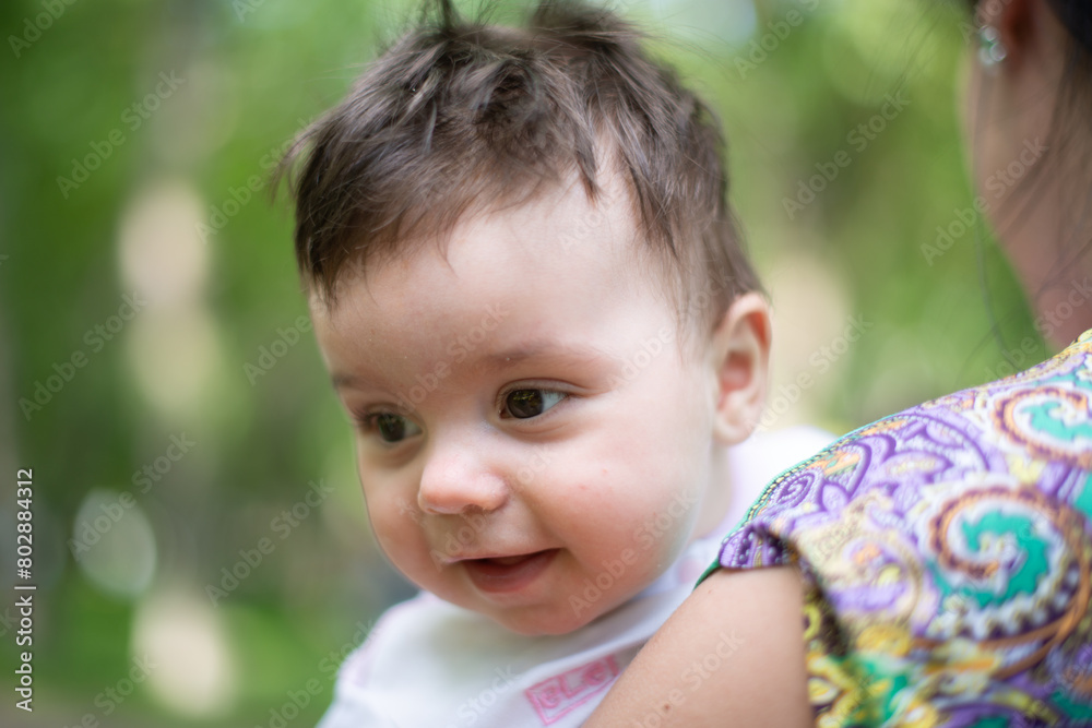 mother with baby, child in parent's arms, baby in pink overalls, baby laughing, happy baby, boy, girl, summer vacation, summer weekend, maternity leave mother with baby, child in parent's arms, baby in pink overalls, baby laughing, happy baby, boy, girl, summer vacation, summer weekend, maternity leave