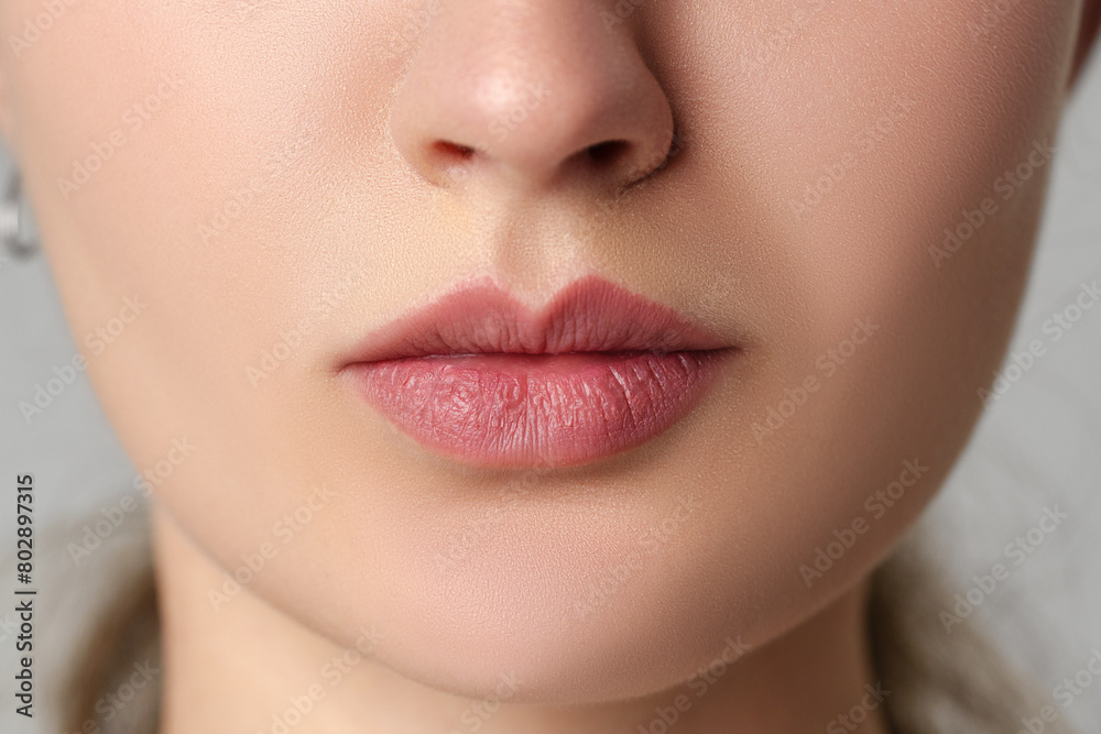 Close up of pink natural female lips