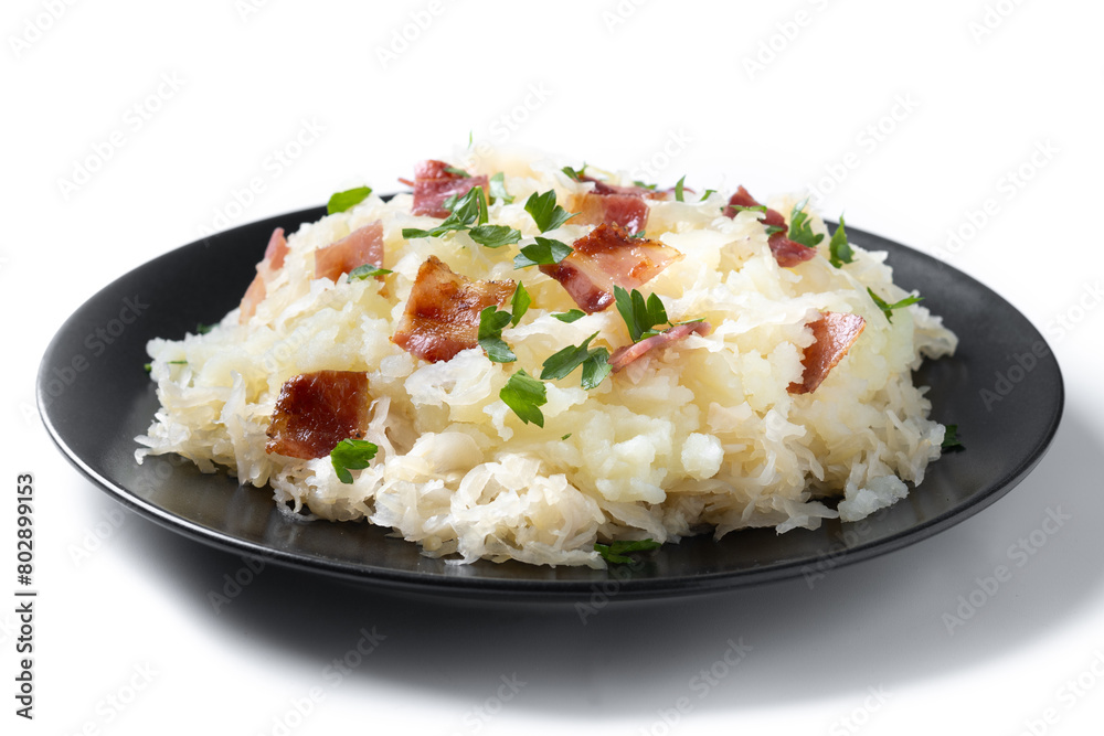 Slovak potato dumplings halusky with steamed sauerkraut and bacon isolated on white background Slovak potato dumplings halusky with steamed sauerkraut and bacon isolated on white background