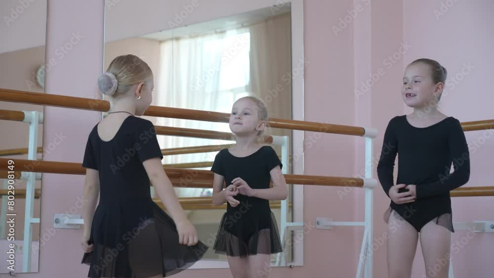 Children's ballet school. Little girls training at the ballet barre. Children's ballet school. Little girls training at the ballet barre.