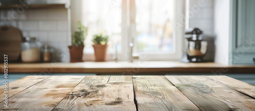Wooden tabletop with empty space above blurred kitchen window backdrop