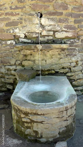 Mineral potable medicinal water flowing from the underground source of former Sobrance spas in Slovakia photo