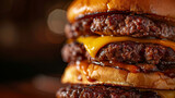 Close-up of double burgers, showcasing the succulent beef patties nestled between toasted buns.
